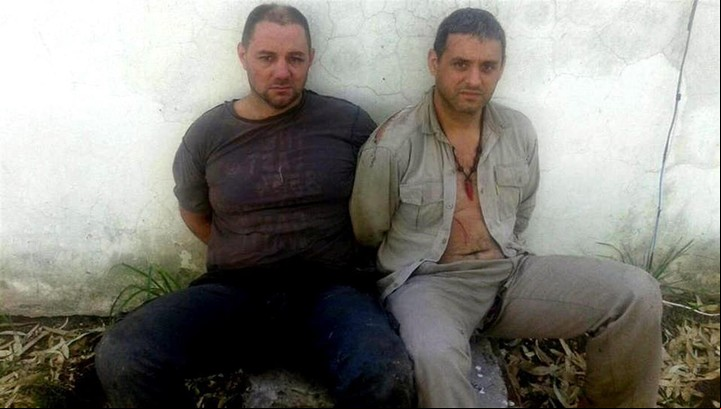 CLAIMA20160302_0013 Cristian Lanatta y Víctor Schillaci, al momento de ser detenidos en Santa Fe. (Foto: DyN).