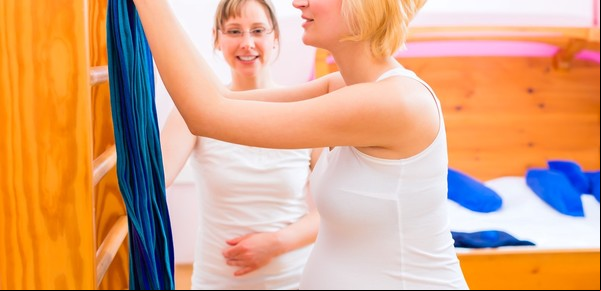 ¿Cuál es la función de una doula en el embarazo y posparto?