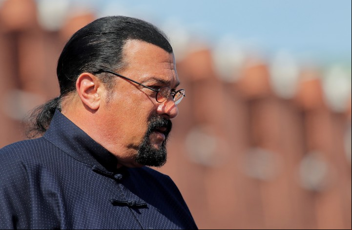 FILE PHOTO: U.S. actor Steven Seagal watches a parade in Red Square in Moscow, Russia May 9, 2018. REUTERS/Maxim Shemetov/File Photo