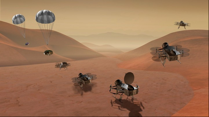 Representación artística del aterrizaje y despliegue del cuadricóptero dual Dragonfly propuesto en la superficie de Titán. NASA, vía Associated Press