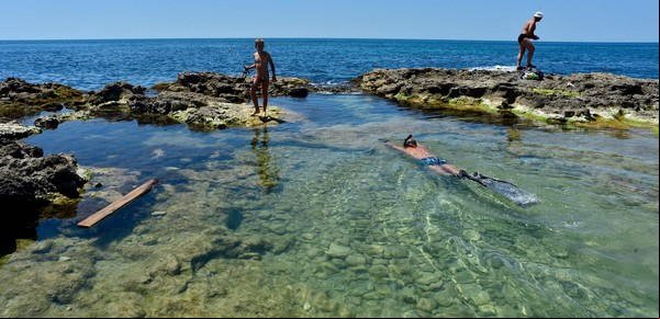 De vacaciones en Crimea, a 300 km del frente y entre aviones y buques de guerra