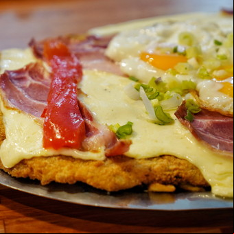 Este es el bodegón con las mejores milanesas de Parque Patricios: son gigantes y se sirven con fritas