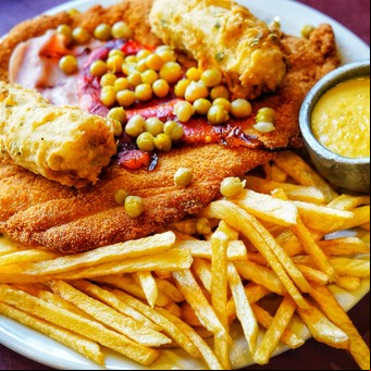 Suprema Maryland con papas fritas