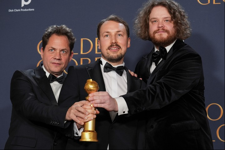 Ron Dyens, Gints Zilbalodis y Matiss Kaza, los creadores de "Flow". Foto AP
