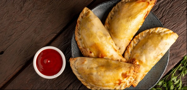 De dónde viene la empanada argentina: historia y sabores populares del clásico nacional